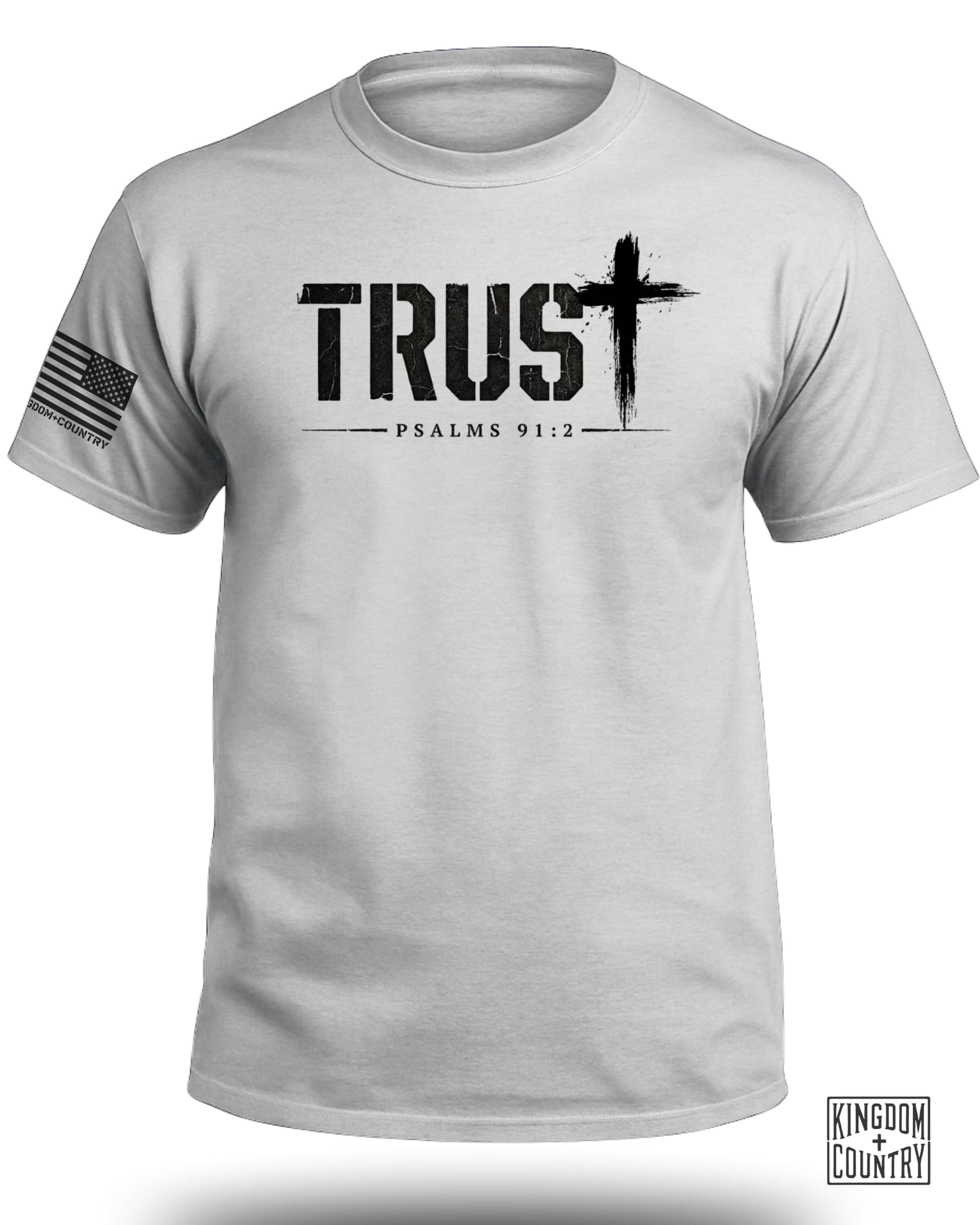 White t-shirt with "TRUST" and "PSALMS 91:2" text, a distressed cross, and an American flag graphic.