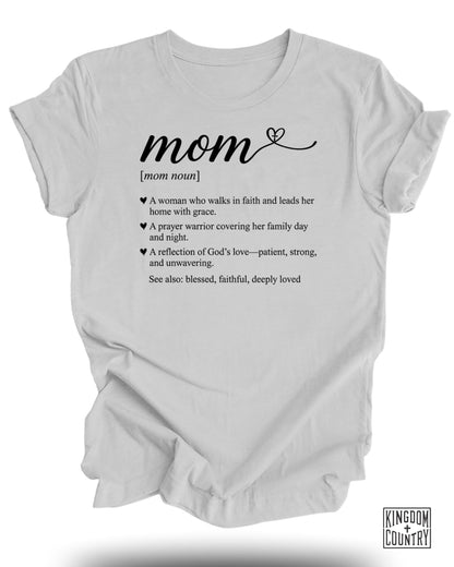 White t-shirt with "mom" definition and "Kingdom Country" logo.