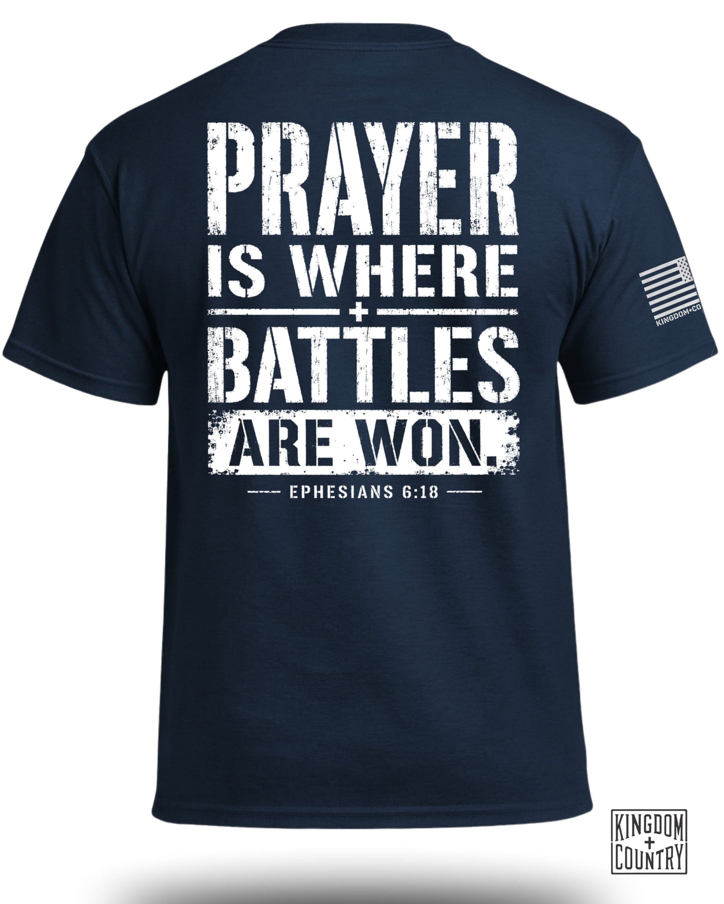 Navy t-shirt with white text "PRAYER IS WHERE BATTLES ARE WON. EPHESIANS 6:18".