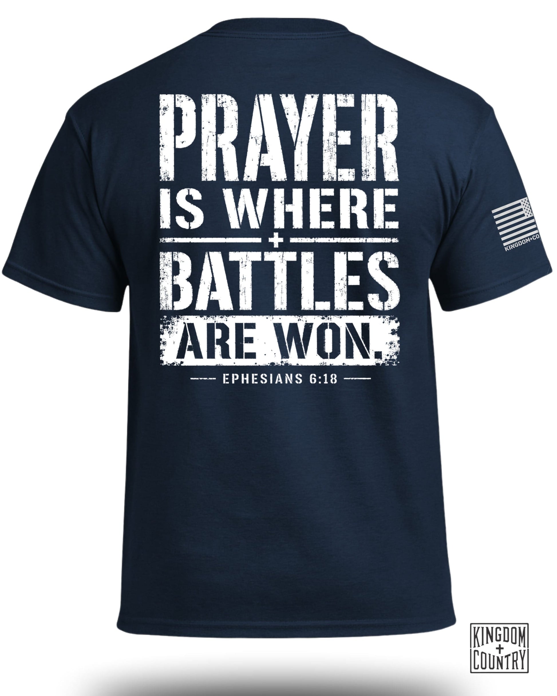 Navy t-shirt with white text "PRAYER IS WHERE BATTLES ARE WON. EPHESIANS 6:18".