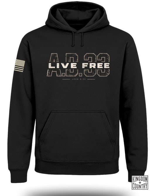 A black hooded sweatshirt featuring a distressed graphic with the text LIVE FREE AD 33.