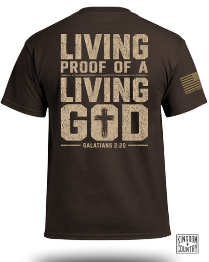 Brown t-shirt with faded text "LIVING PROOF OF A LIVING GOD" and "