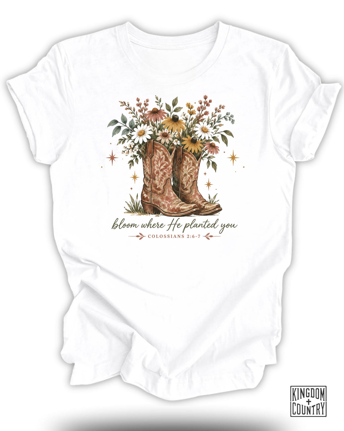 White t-shirt with cowboy boots, floral bouquet, and text: "bloom where He planted you"