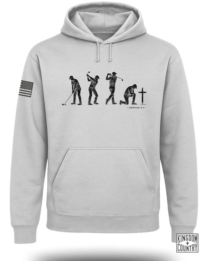 Gray hoodie with graphic of golfer's evolution, cross, and Bible verse.