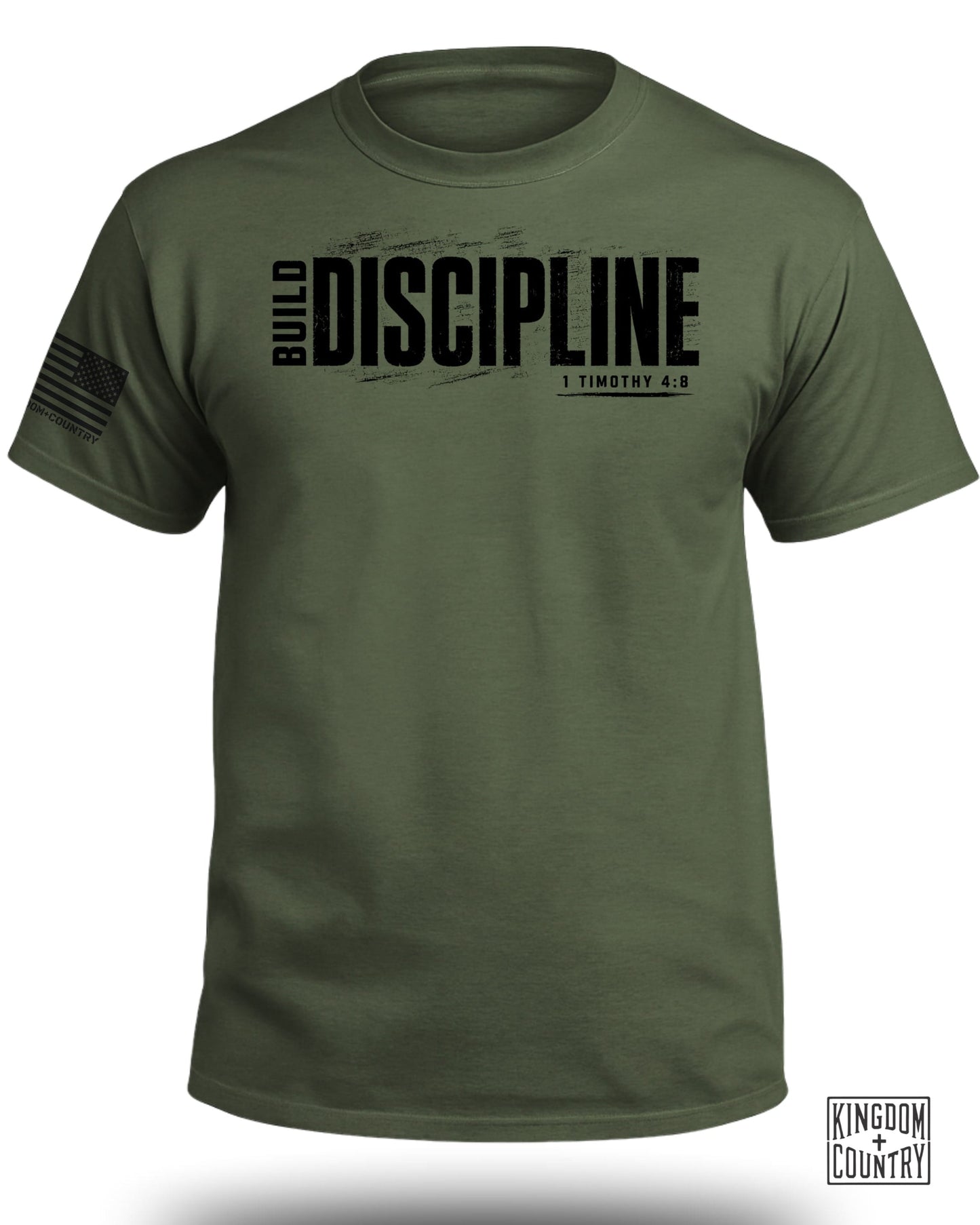 Olive t-shirt with "BUILD DISCIPLINE" and "1 TIMOTHY 4:8" text and flag graphic.