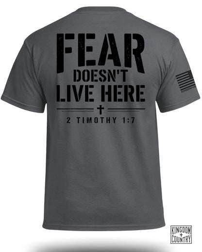 Gray t-shirt with "FEAR DOESN'T LIVE HERE + 2 TIMOTHY 1:7" on back.
