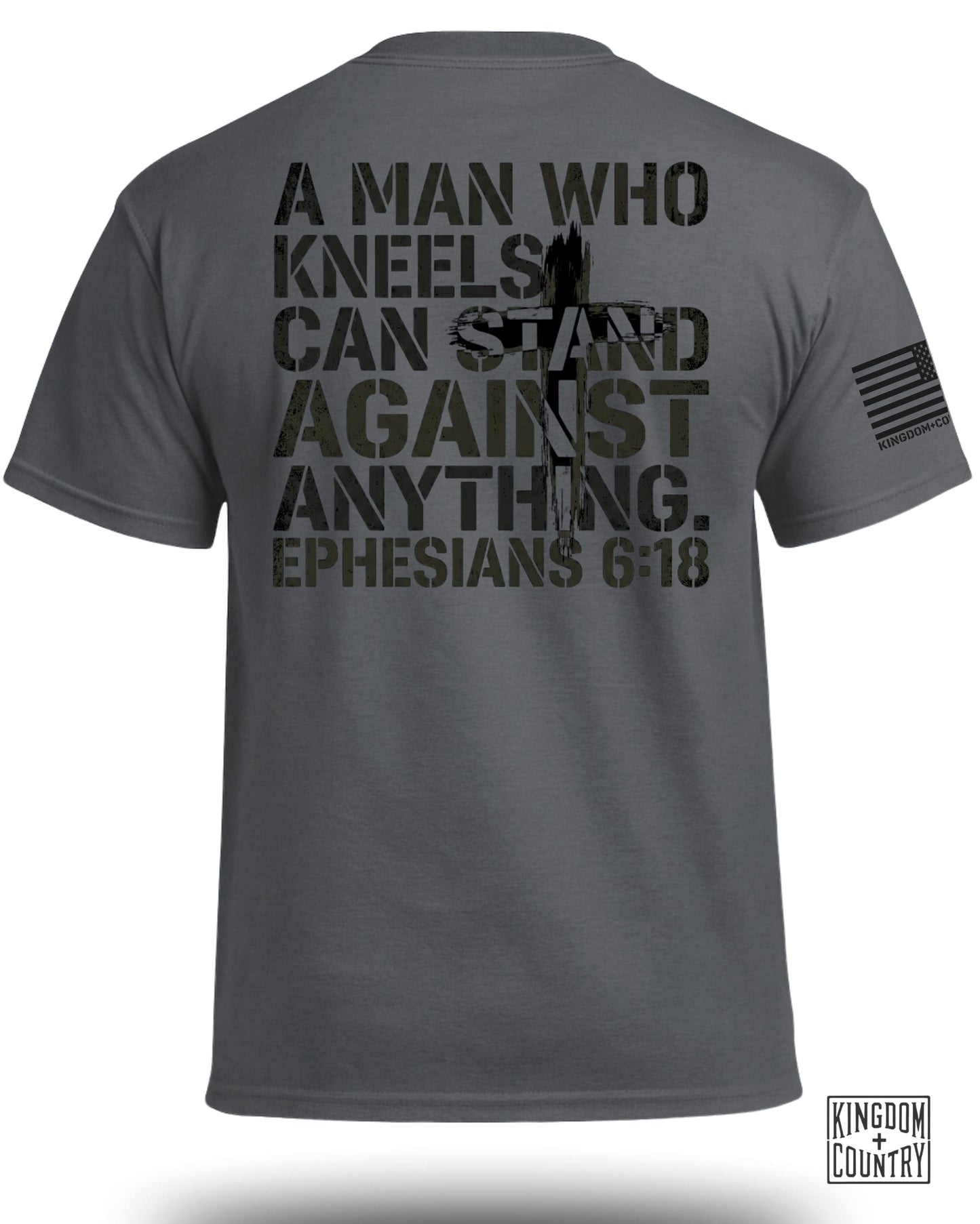 Dark grey t-shirt with "A man who kneels can stand against anything. Ephesians 6:18" text.