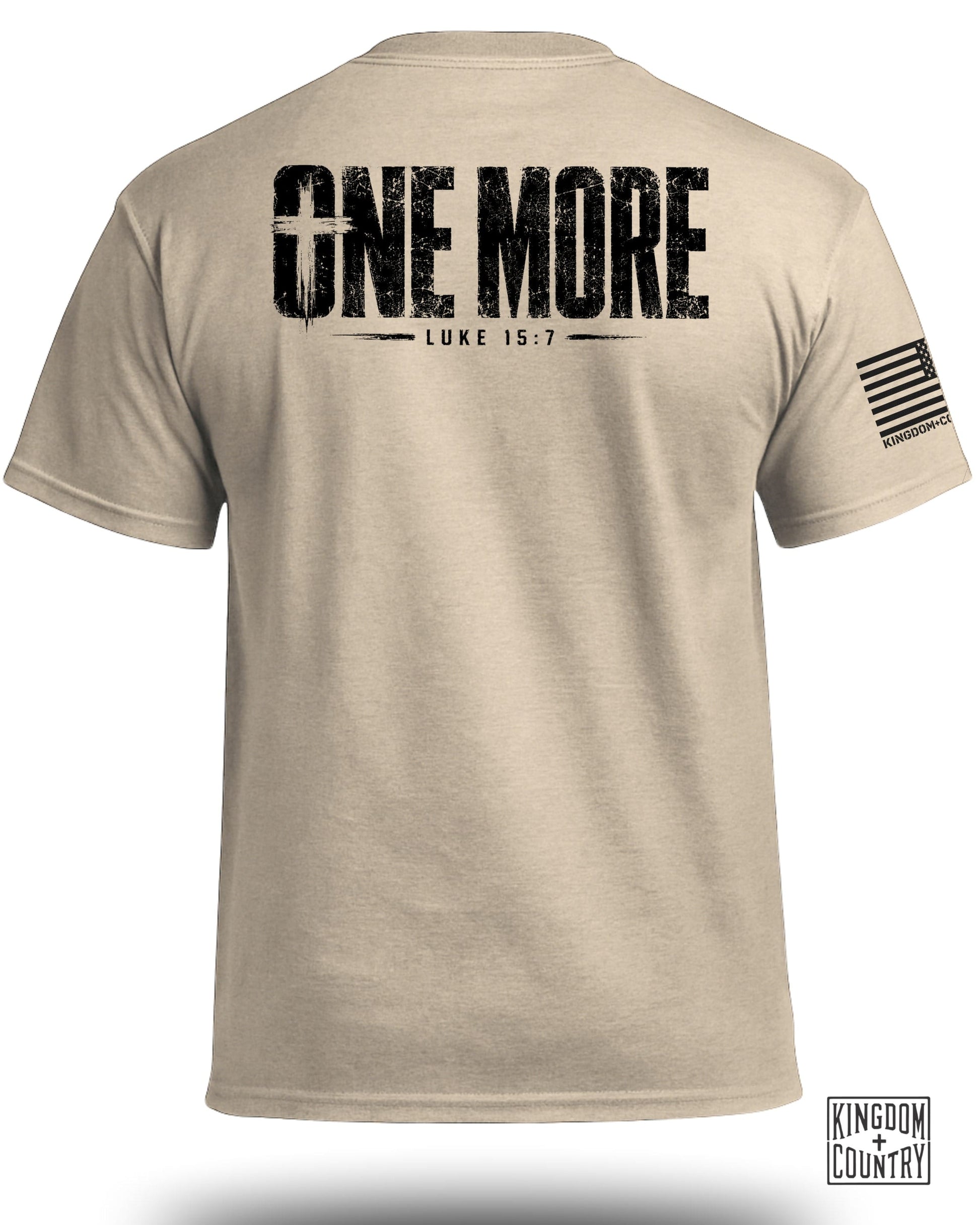 Tan t-shirt with "ONE MORE LUKE 15:7" graphic, American flag sleeve detail, and logo.