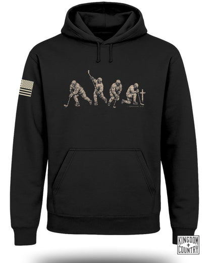 Black hoodie with vintage hockey player graphic and "1 Corinthians 10:31" text.