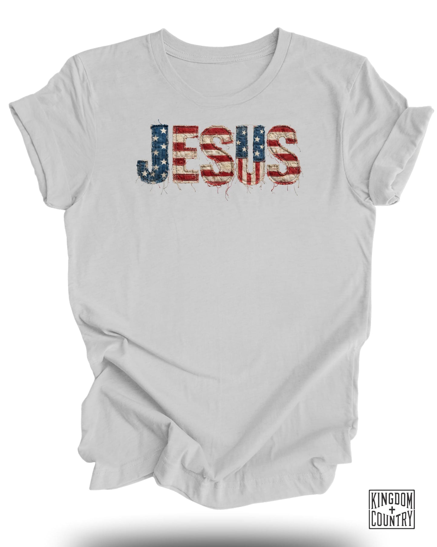 White t-shirt with distressed American flag "JESUS" graphic.