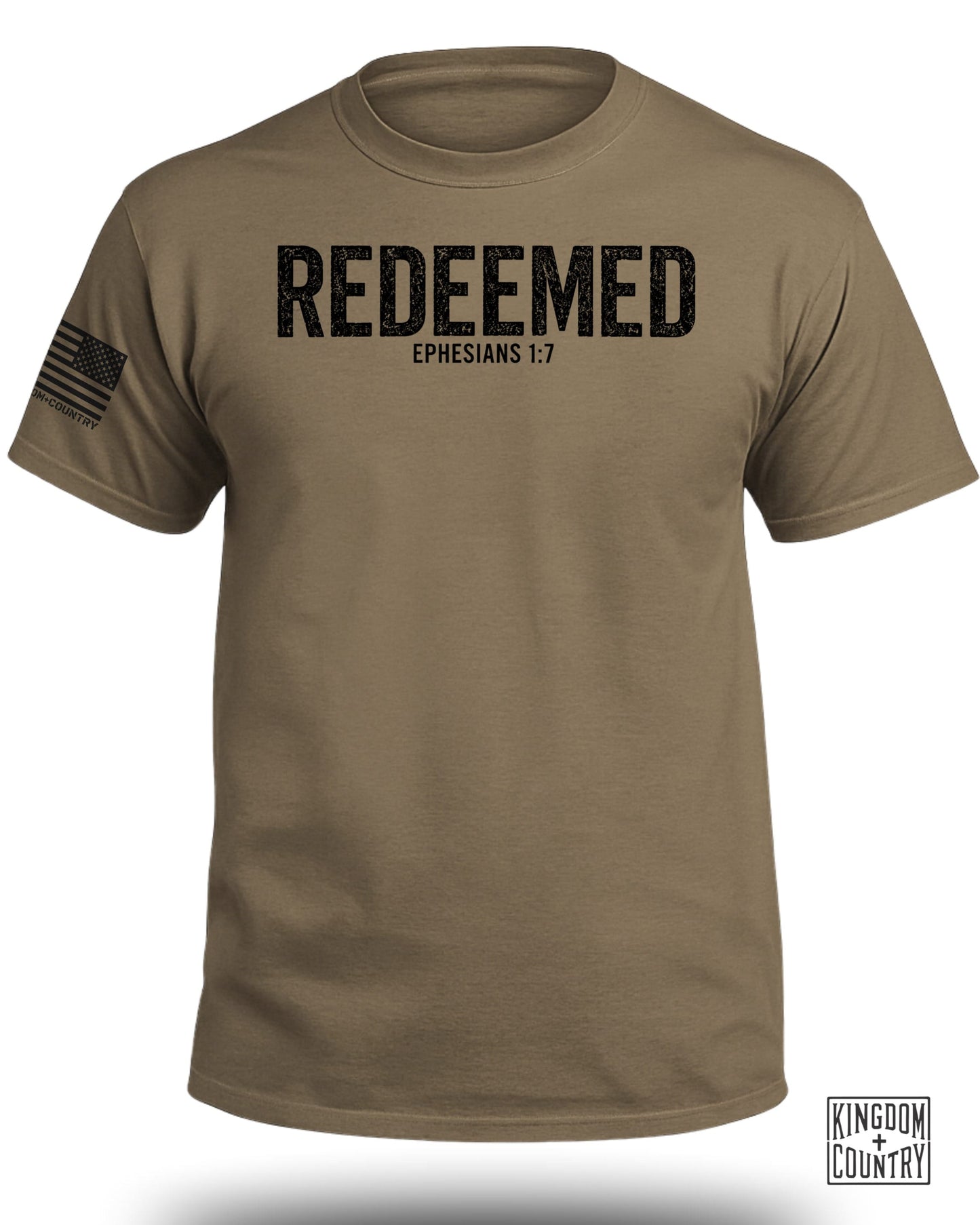 Tan t-shirt with "REDEEMED EPHESIANS 1:7" text and US flag on sleeve.