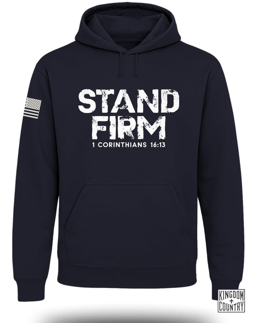 Navy hoodie with distressed "STAND FIRM" text and "1 CORINTHIANS 16:13" on front.